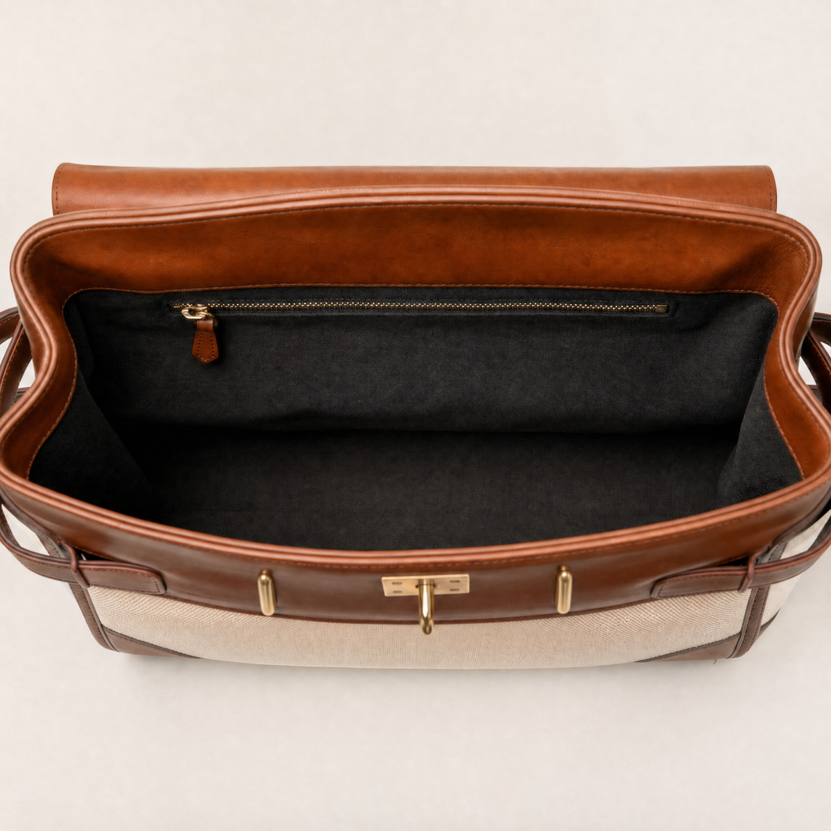 Delphine with its lined interior and zipped pocket visible.